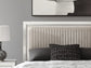Zuraleus Queen Upholstered Panel Bed, Dresser, Mirror, Chest and Nightstand